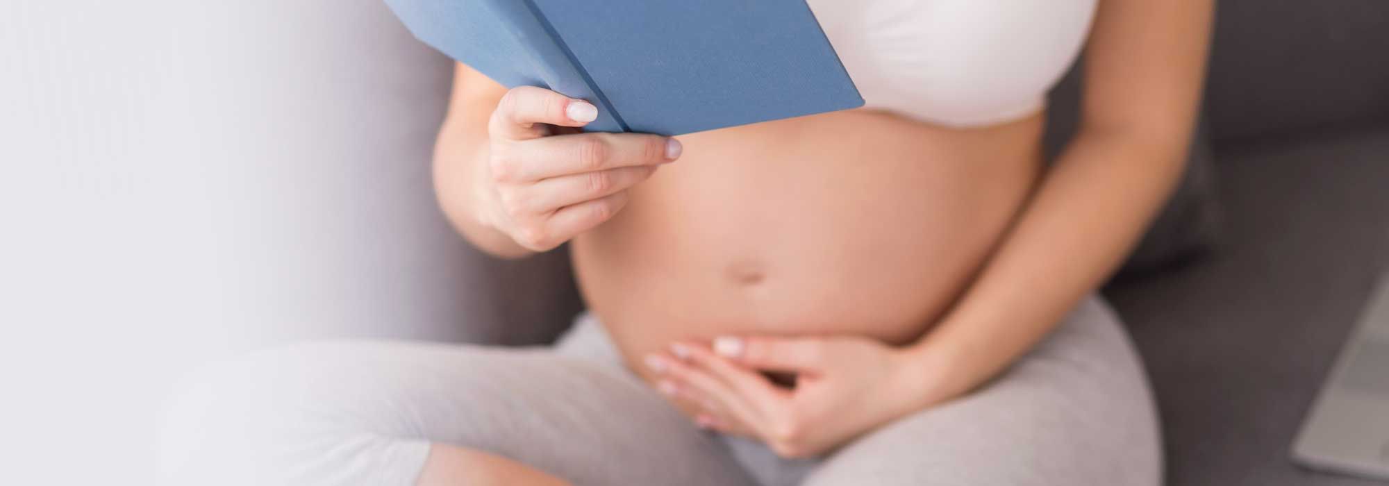 Pregnant woman reading